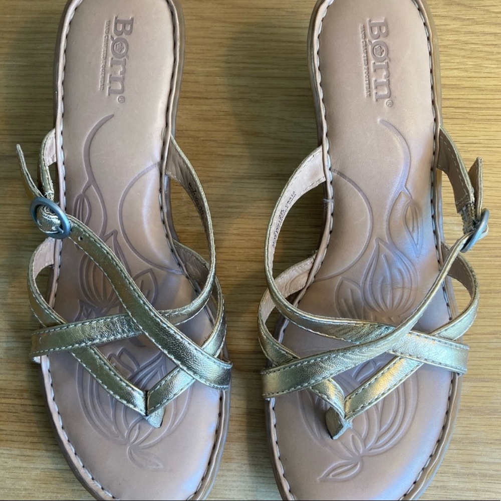 Born metallic gold buckle strap sandals with block heel.